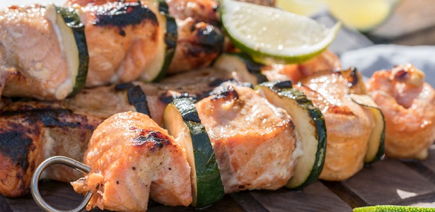 delicious grilled salmon kebab with a zucchini